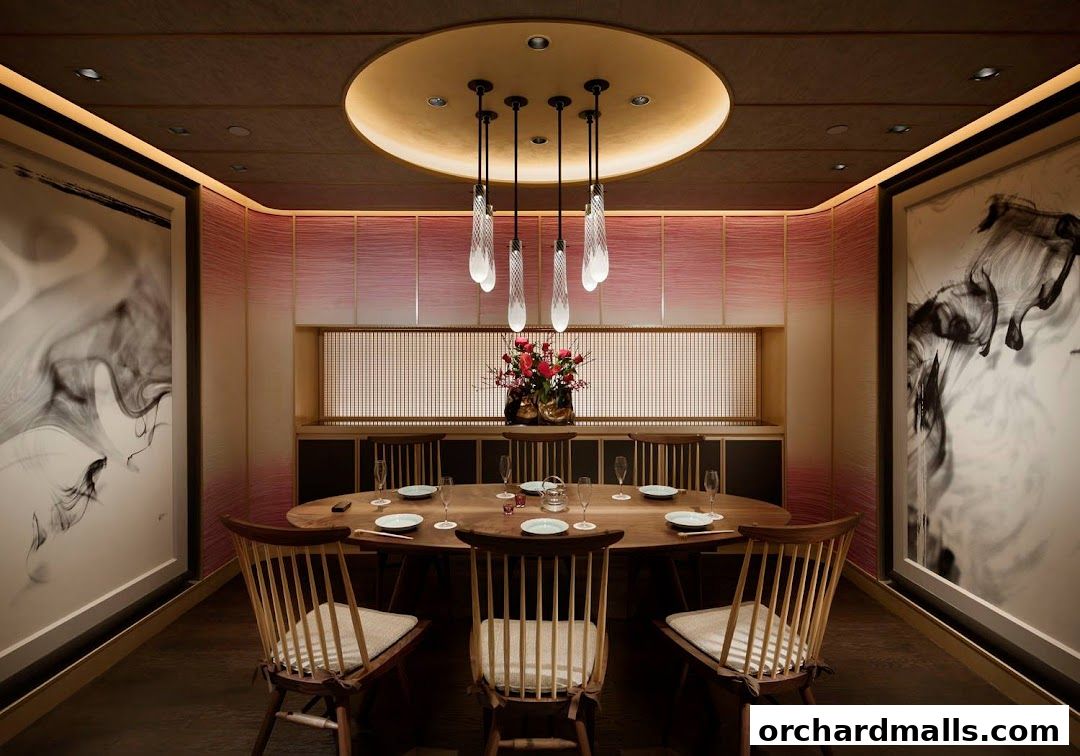 Elegant dining room with a large oval table, chairs, and artistic wall decor.