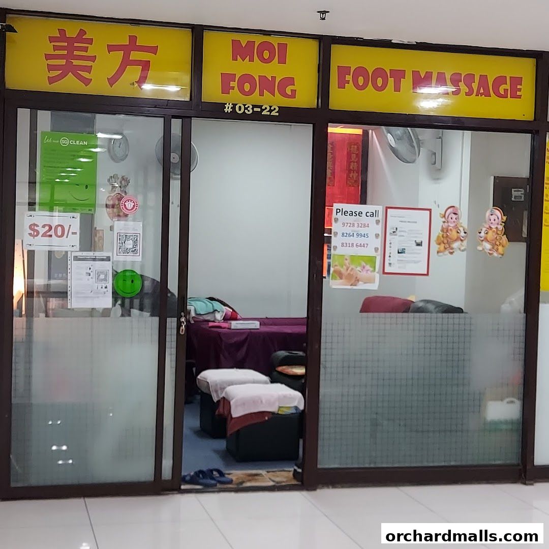 Exterior view of Moi Fong Foot Reflexology Center with signage and interior visible.