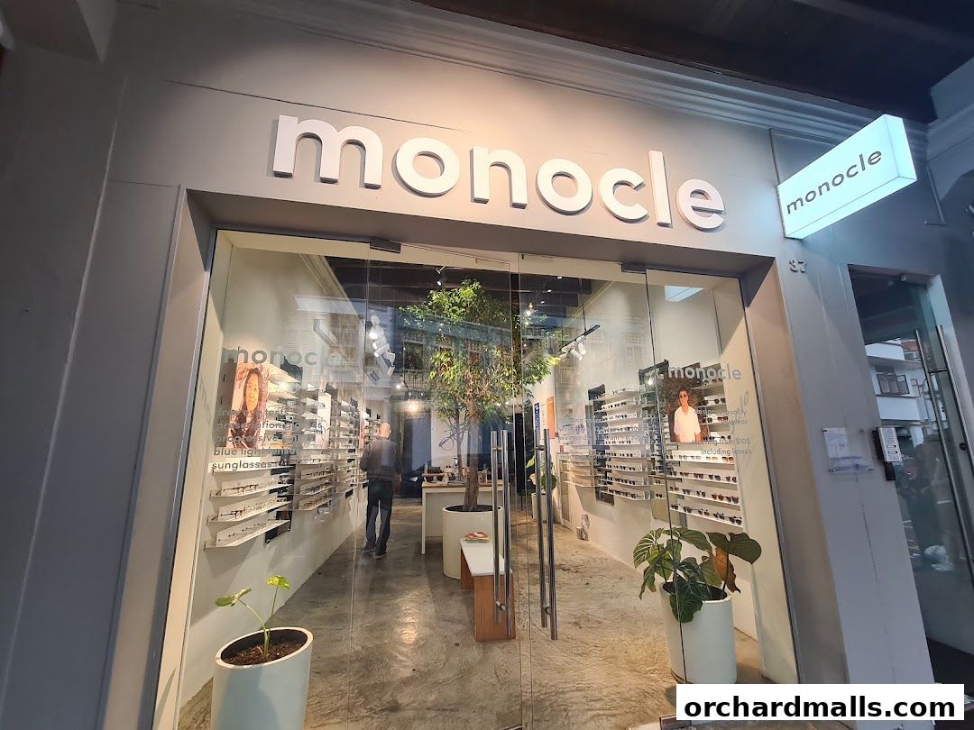 The exterior of Monocle, an eyewear shop, showcasing a wide selection of glasses.