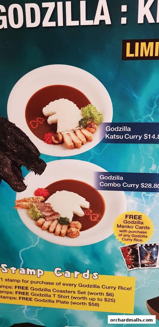 A menu featuring Godzilla-themed curry dishes and a stamp card promotion.