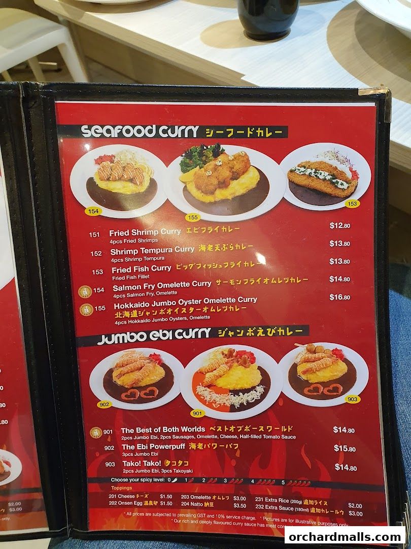 A menu from Monster Curry featuring Seafood Curry and Jumbo Ebi Curry dishes.