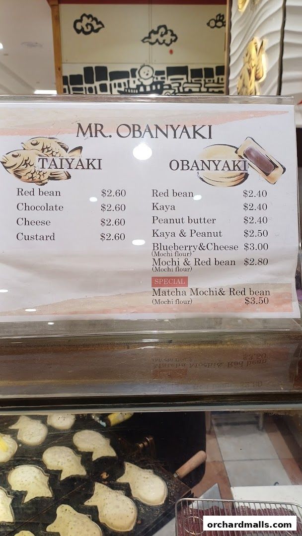 A menu board displays prices for Taiyaki and Obanyaki Japanese pancakes.