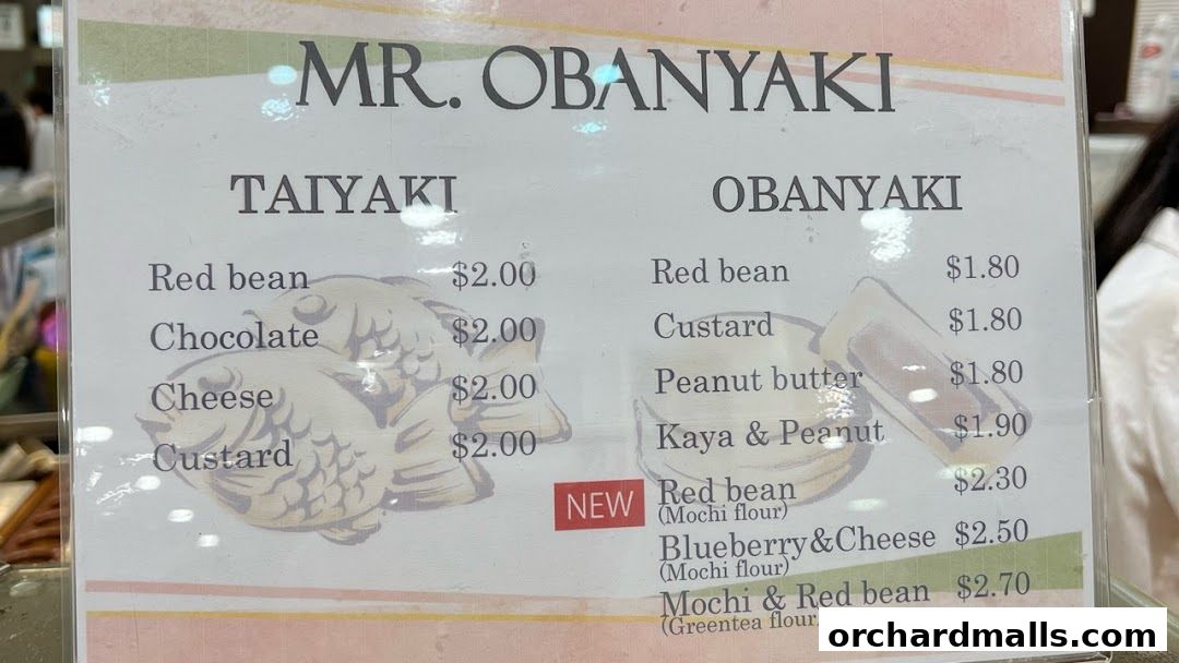 A menu board displaying various Taiyaki and Obanyaki flavors and prices.