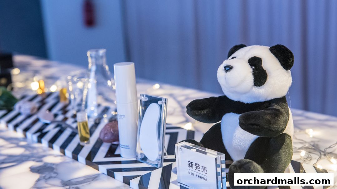A panda plush toy sits next to skincare products and decorative lights.