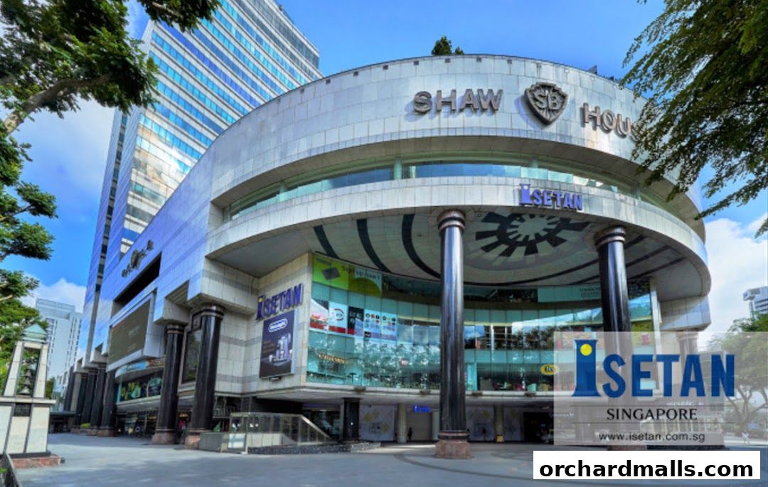 Exterior view of Shaw House, featuring Isetan department store and other shops.