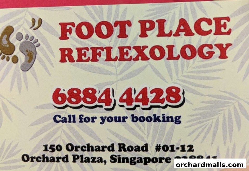 A business card for My Foot Place Reflexology, featuring contact and address details.