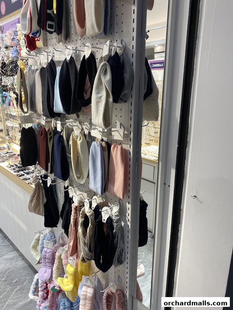 A display of various headbands and hair accessories in a retail shop.