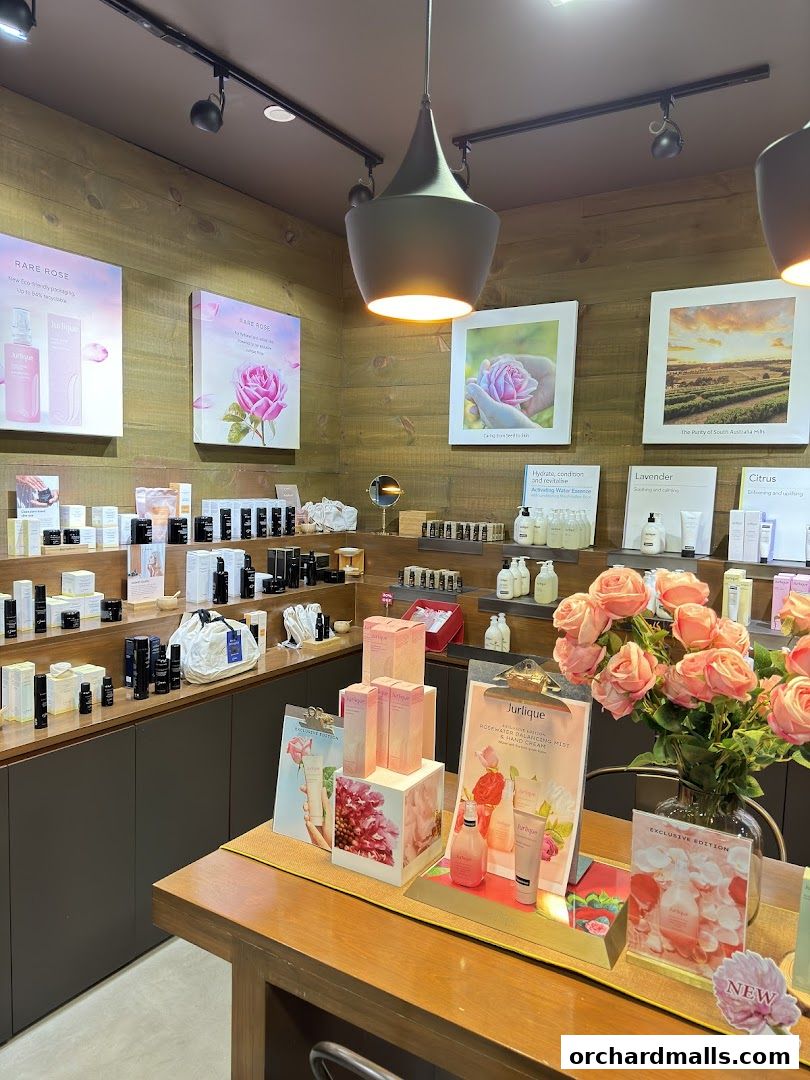Interior view of a Natures Spa shop with skincare products and floral displays.