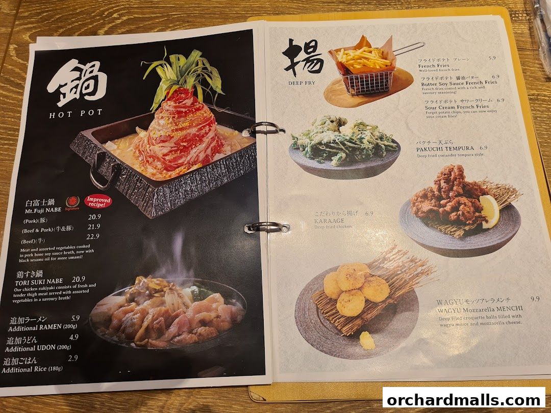 A menu from Niku Kappo featuring hot pot, deep-fried items, and wagyu mozzarella menchi.
