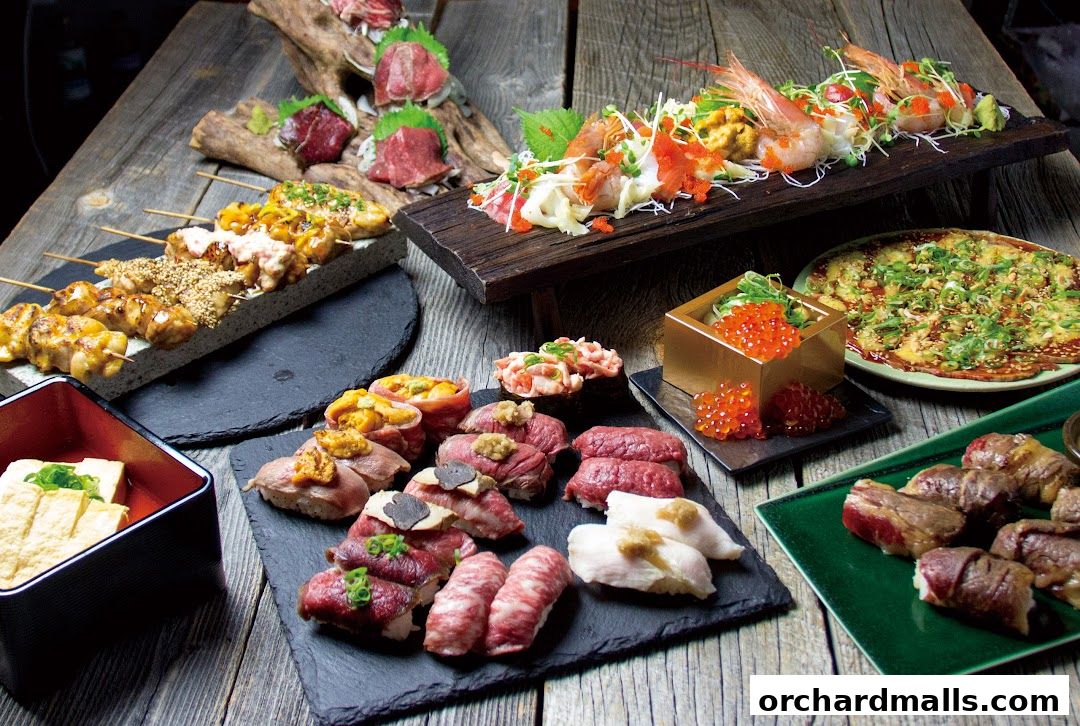 A spread of delicious Japanese dishes including sushi, skewers, and a pizza.