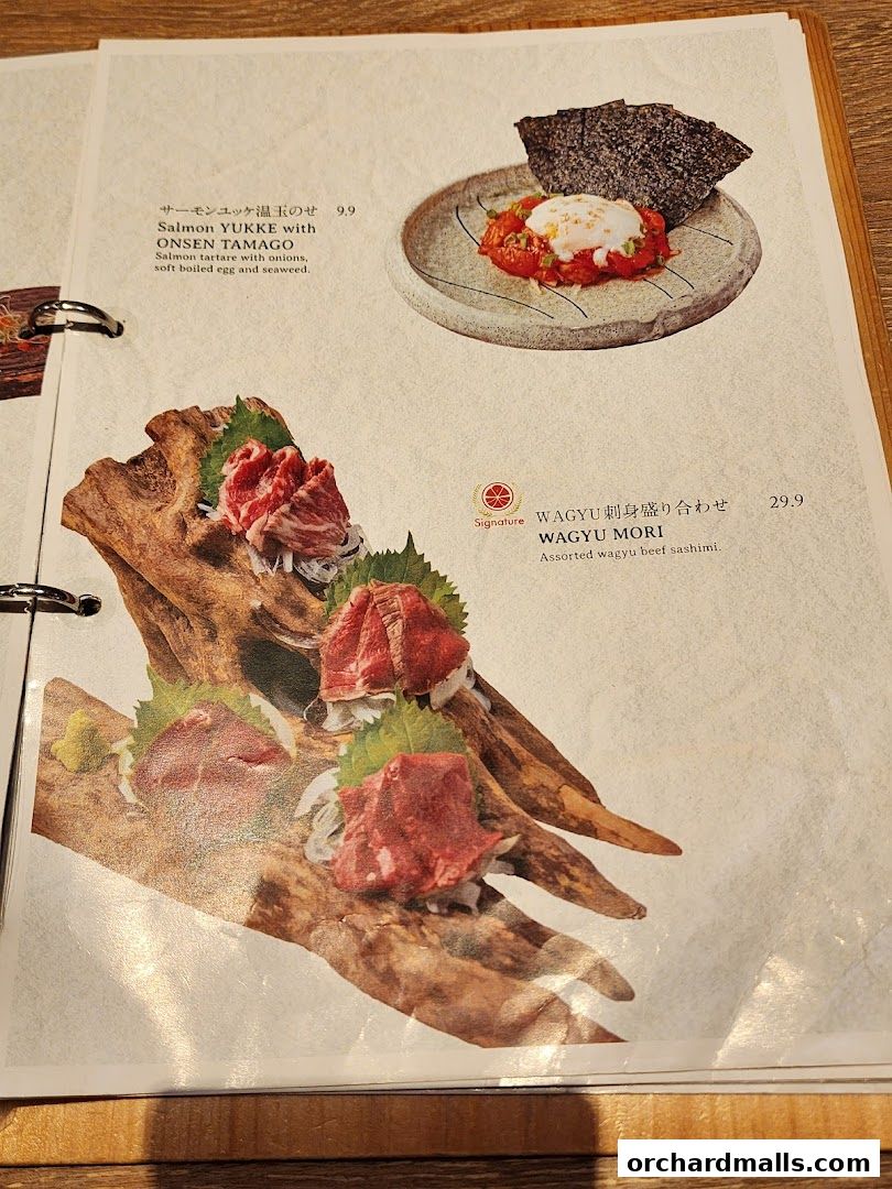 A menu page featuring two Japanese dishes: Salmon Yukke with Onsen Tamago and Wagyu Mori.