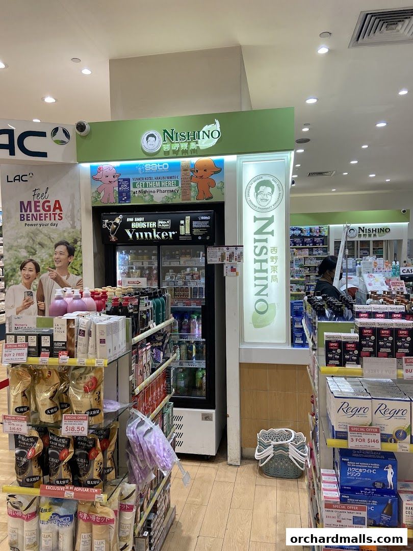 Interior view of Nishino Pharmacy showcasing shelves stocked with health and beauty products.