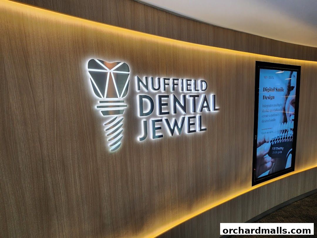 The Nuffield Dental Jewel logo and a digital display about smile design.