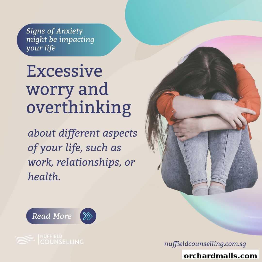Image about signs of anxiety, excessive worry, and overthinking with a person hugging their knees.