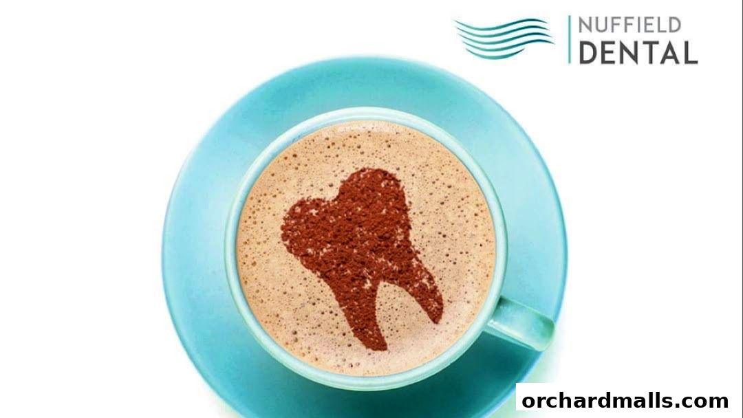A cup of coffee with a tooth design made of cocoa powder.