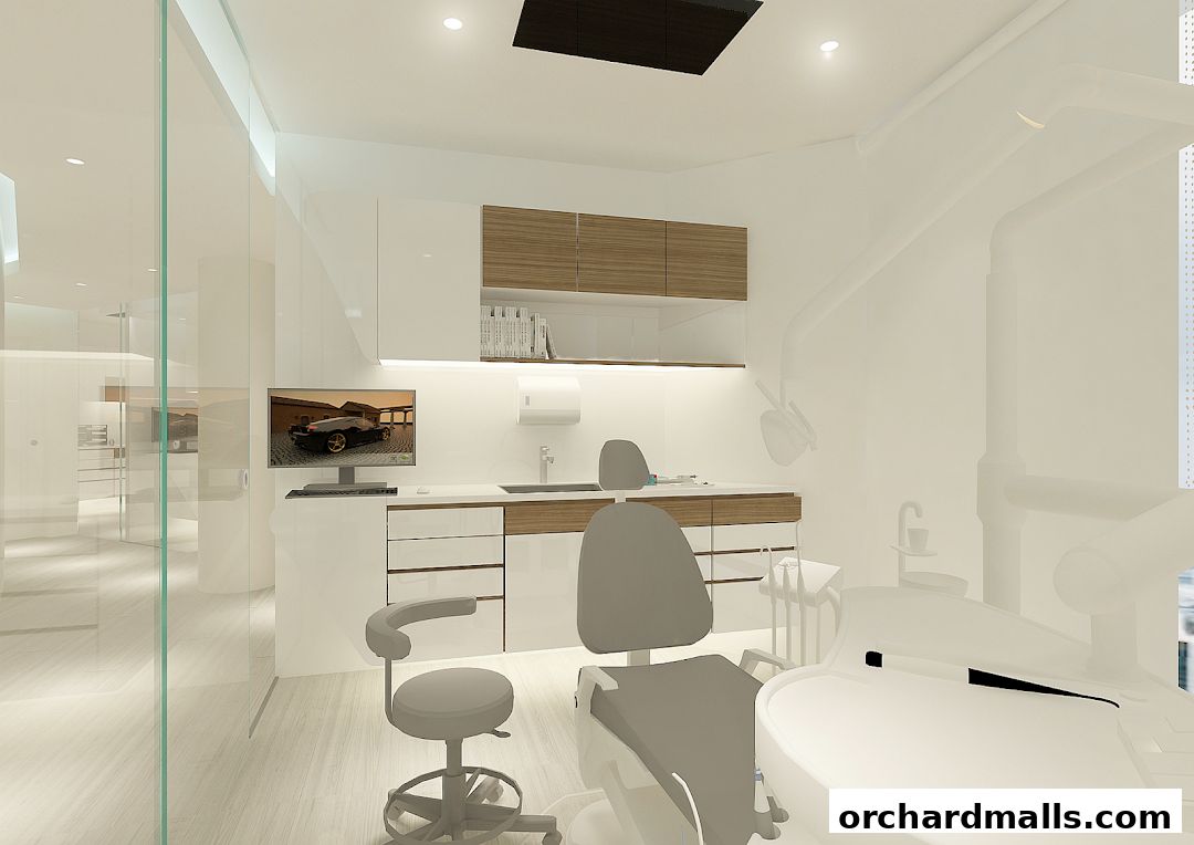 Modern dental clinic interior with examination chairs and clean white cabinetry.
