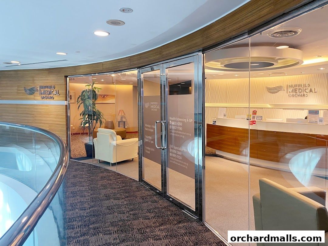 The entrance and reception area of Nuffield Medical Orchard, a modern clinic.