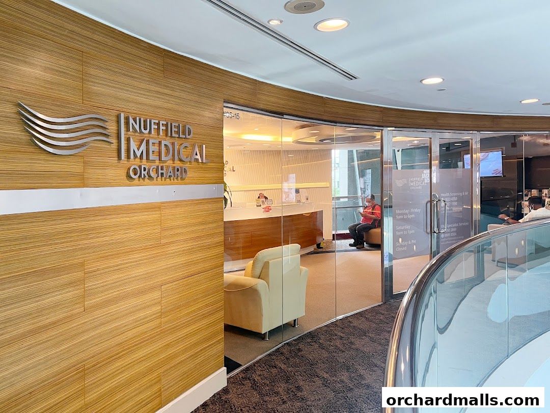 The entrance to Nuffield Medical Orchard, a modern clinic with a reception area visible.