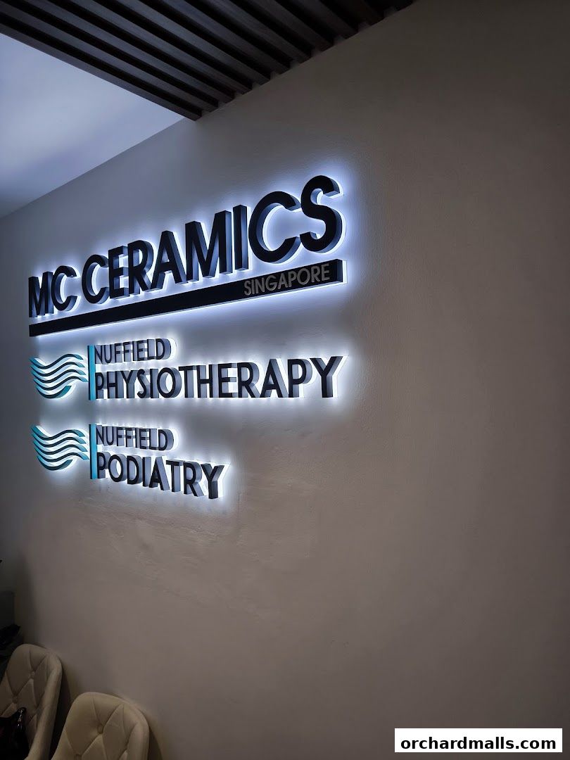 Illuminated signage for MC Ceramics, Nuffield Physiotherapy, and Nuffield Podiatry.