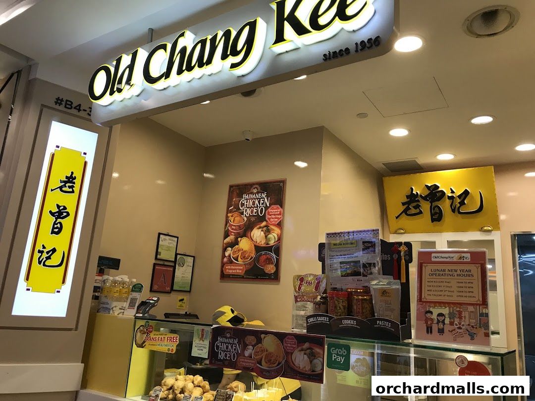 The Old Chang Kee shop front displays its signature Hainanese Chicken Rice 'O and various snacks.