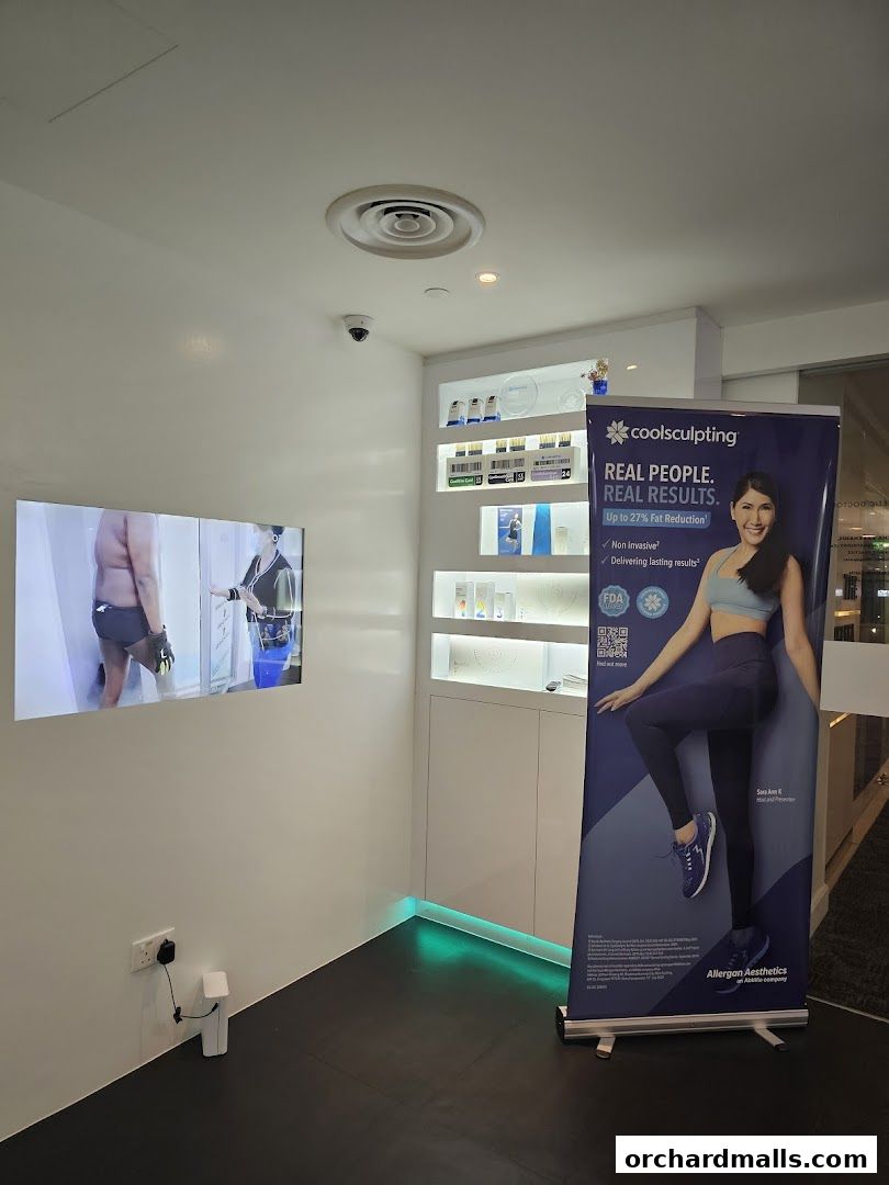 A display area for CoolSculpting treatments at Only Aesthetics, featuring a banner and screen.