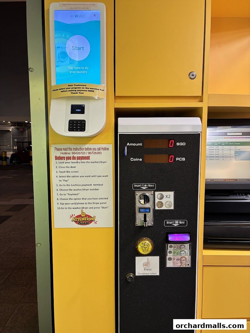 Self-service laundry payment machine with instructions and coin/bill slots.