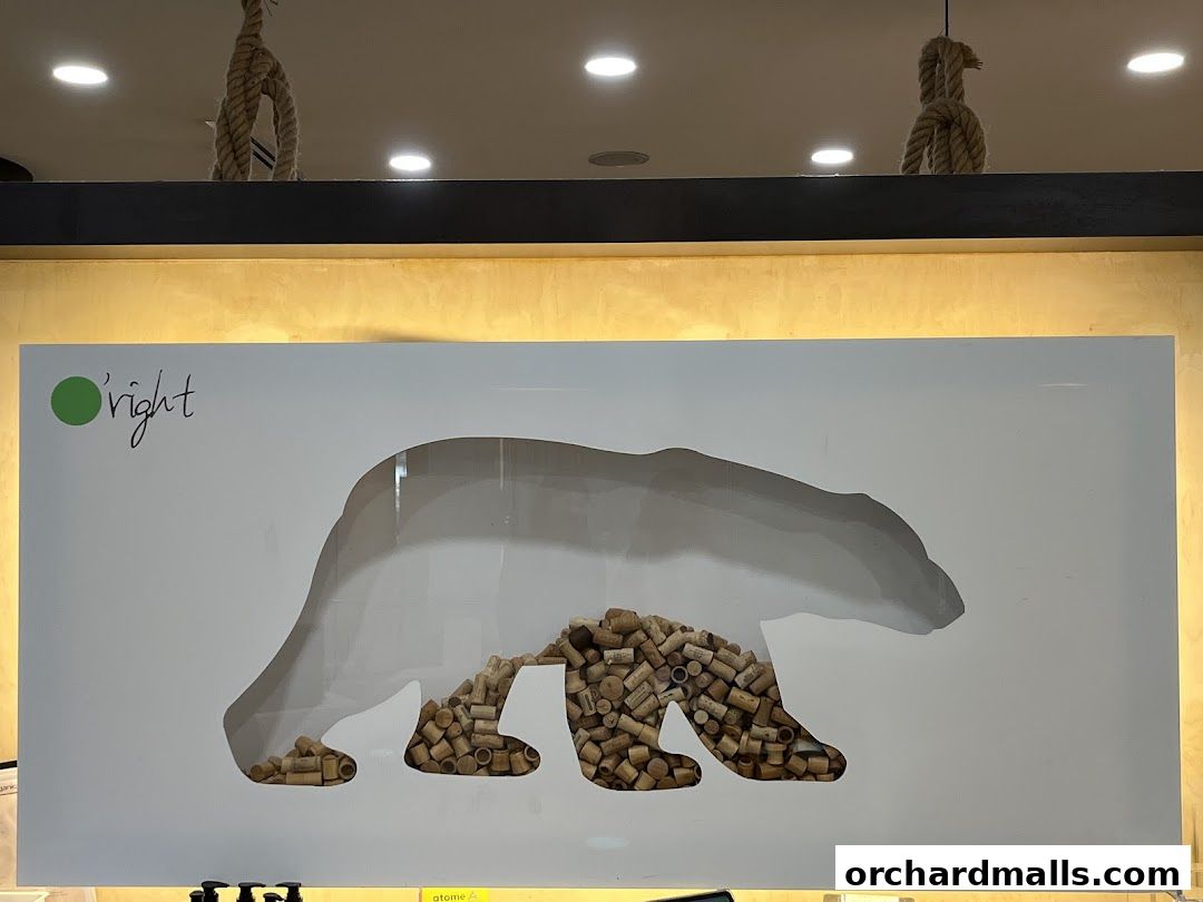 A white panel with a silhouette of a bear filled with corks, featuring the 'O'right' logo.