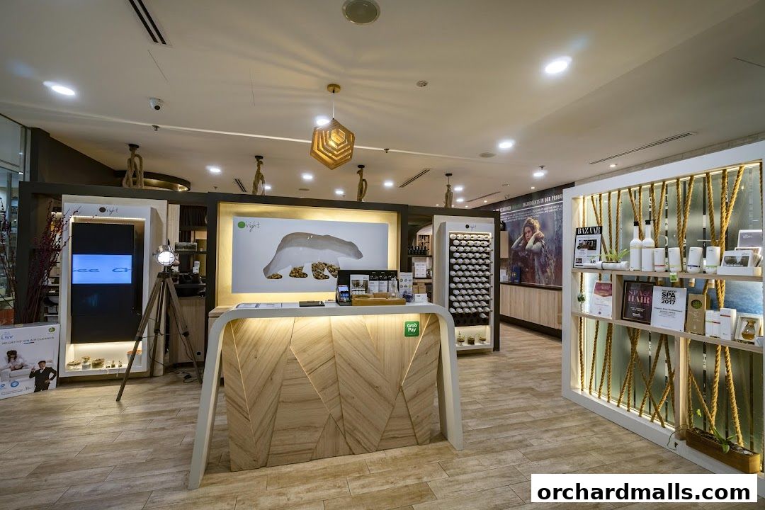 Interior view of Organic Hair Regrowth Solutions shop with a reception desk and product displays.