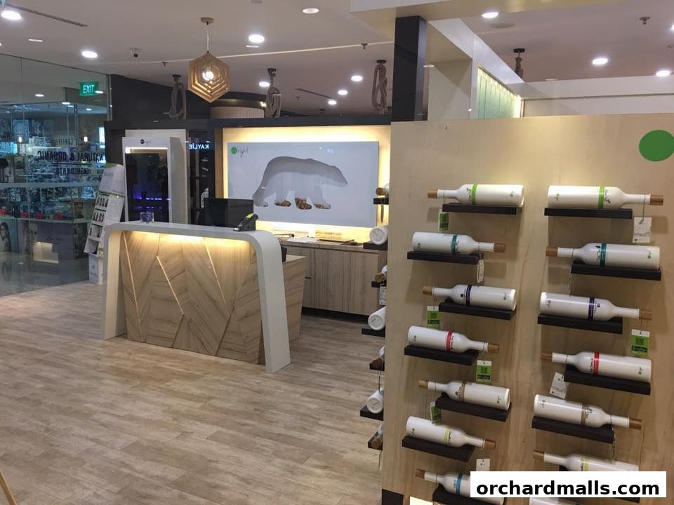 Interior view of Organic Hair Regrowth Solutions shop with a reception desk and product display.