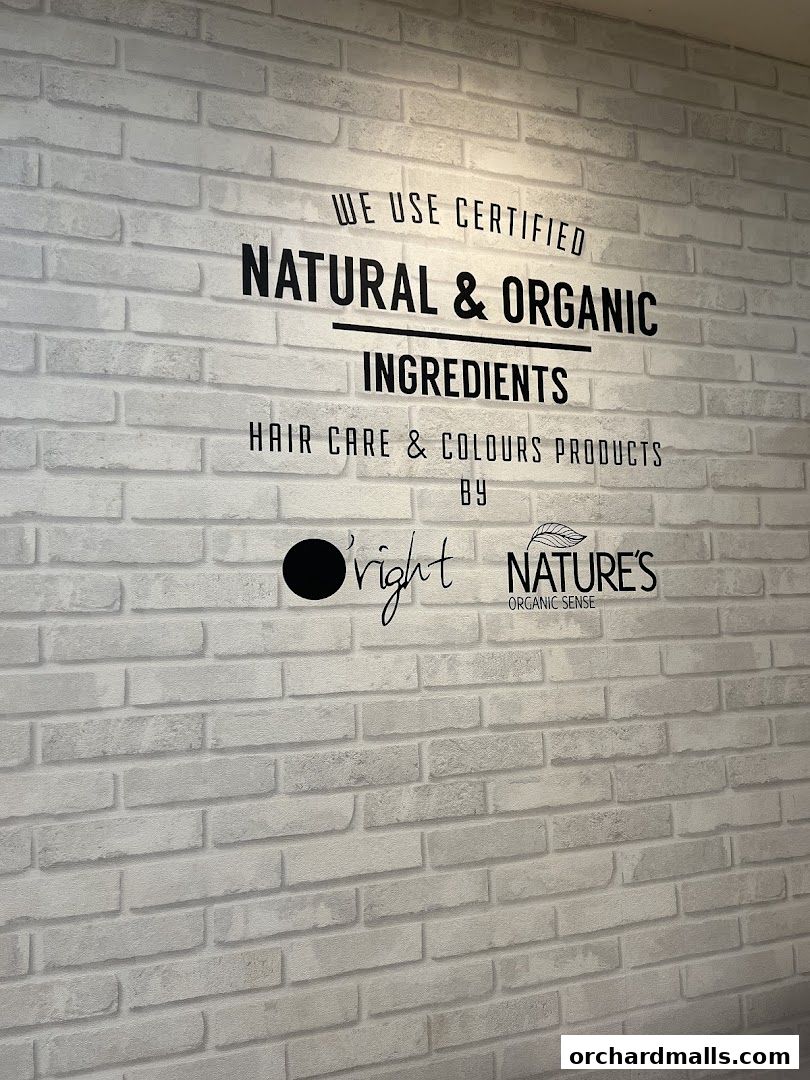 Wall decal promoting natural and organic hair care and color products.