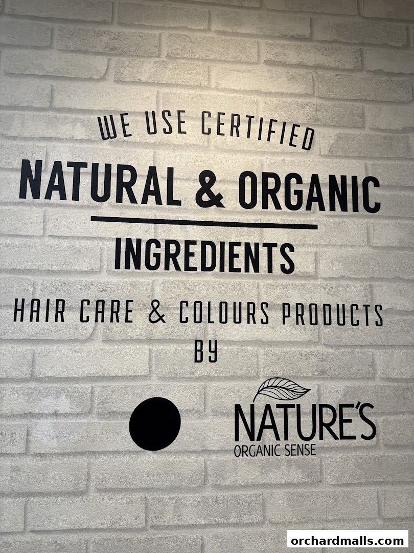 Wall art promoting certified natural and organic hair care and color products.