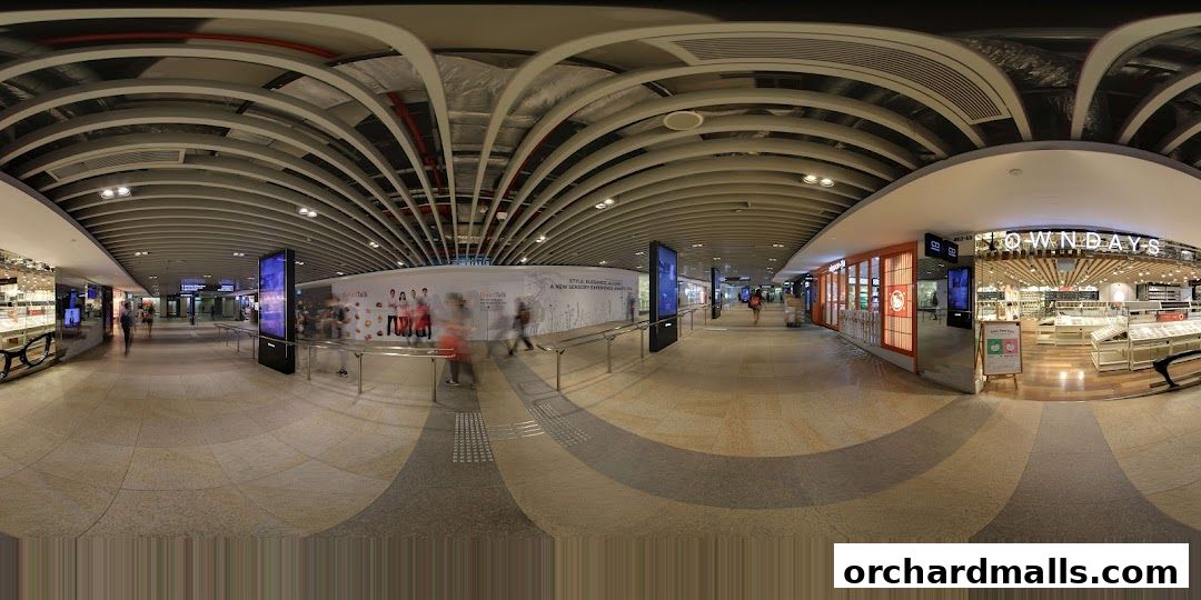 The exterior of the OWNDAYS ION Orchard store, showcasing eyewear displays and the shop's entrance.