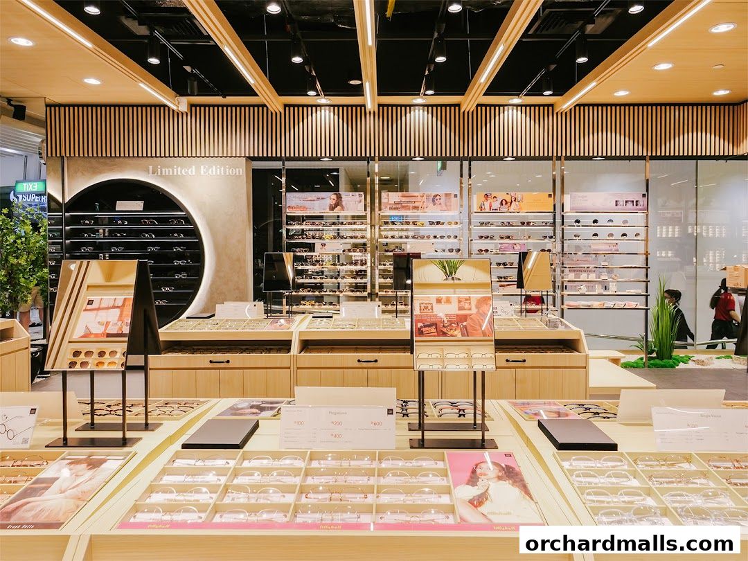 Interior view of an eyeglasses store showcasing a wide selection of frames and displays.