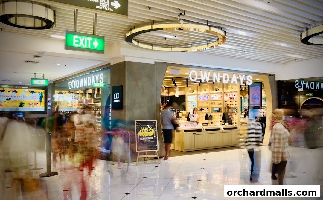 The OWNDAYS Takashimaya S.C. shop front displays eyewear with customers browsing.
