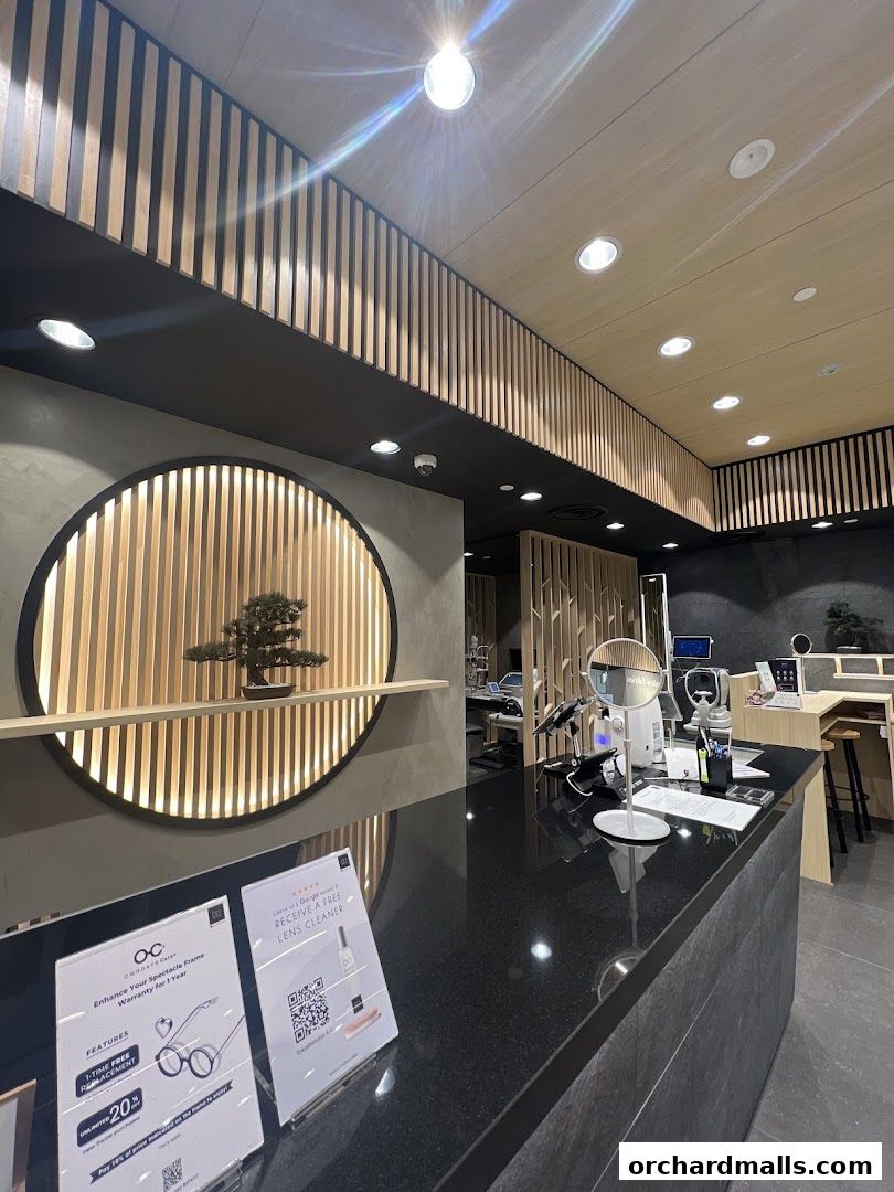 Interior view of OWNDAYS Takashimaya S.C. optical shop with modern decor.