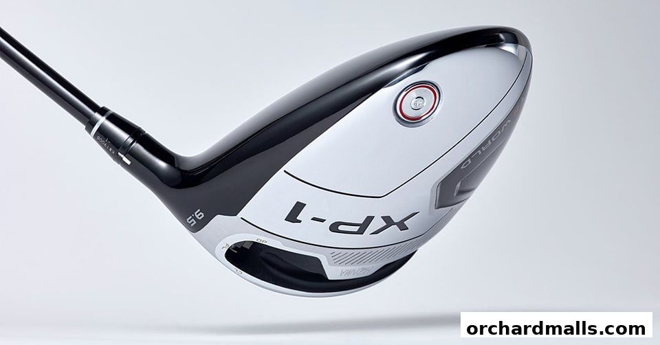 A close-up studio shot of a white and black golf driver with 'XP-1' and 'HONMA' branding.