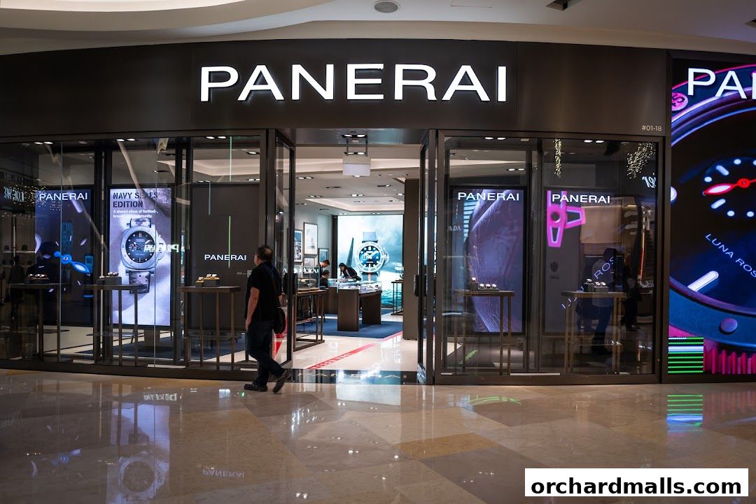 The entrance of a Panerai Boutique, showcasing watches and the brand's logo.