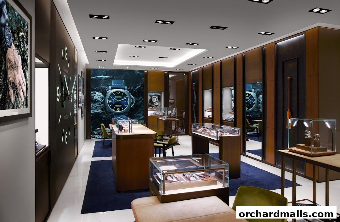 Interior of a luxury watch boutique showcasing display cases with watches and branded decor.