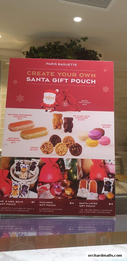 A Paris Baguette menu showcasing custom Santa gift pouches with various pastries and prices.