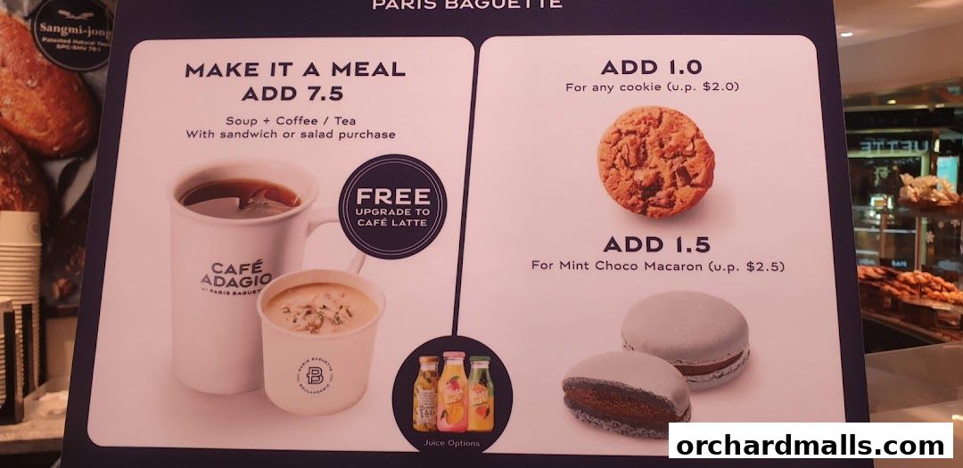 Paris Baguette menu board featuring meal deals and add-on items like cookies and macarons.