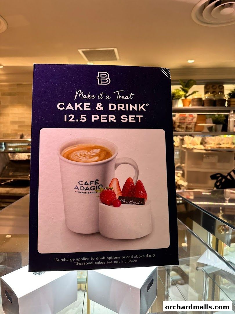 A sign advertising a cake and drink set for 12.5 per set at Paris Baguette.