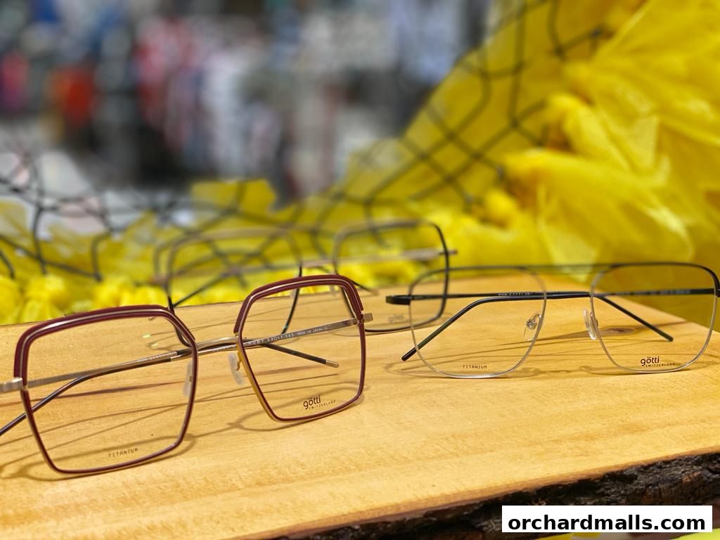Close-up of stylish eyeglasses displayed on a wooden surface.