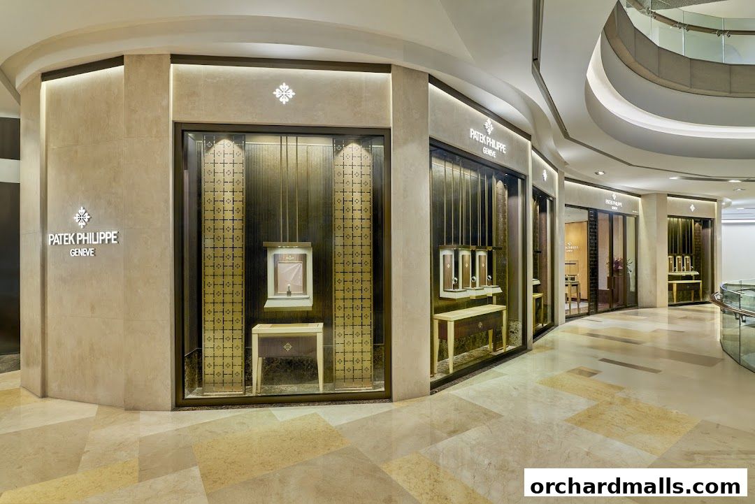 The elegant Patek Philippe boutique entrance with illuminated displays showcasing watches.