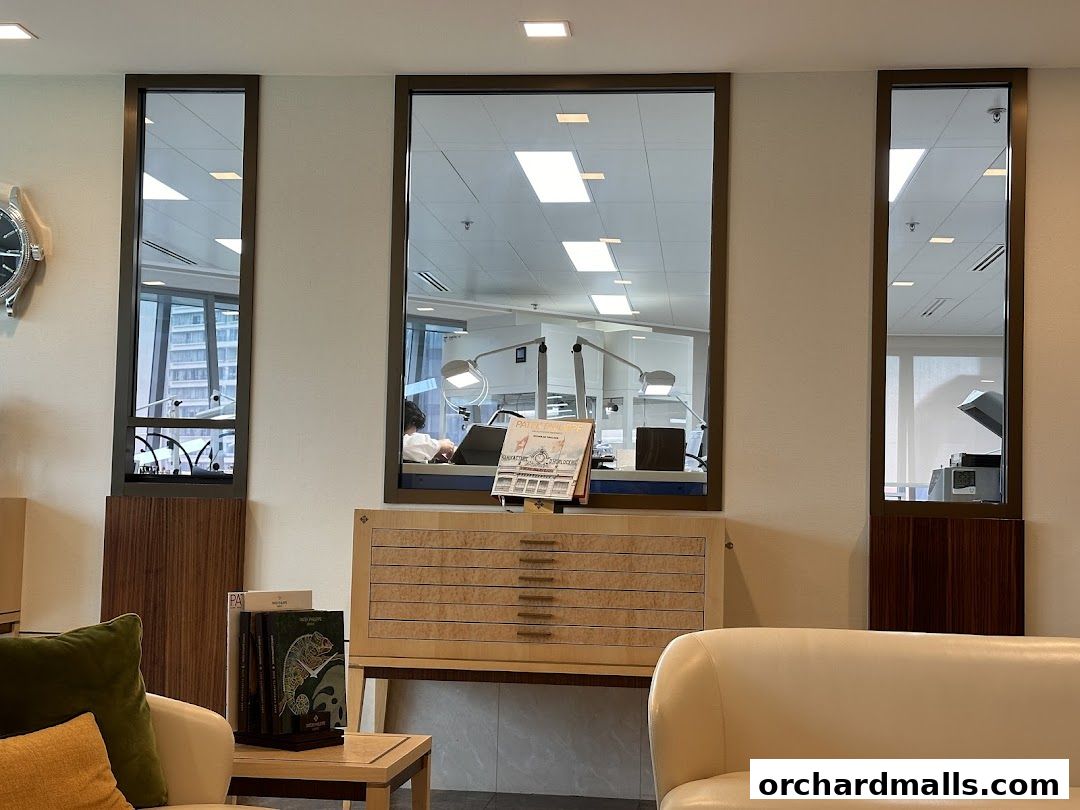 Interior view of Patek Philippe Customer Service Centre with watchmaking stations visible.