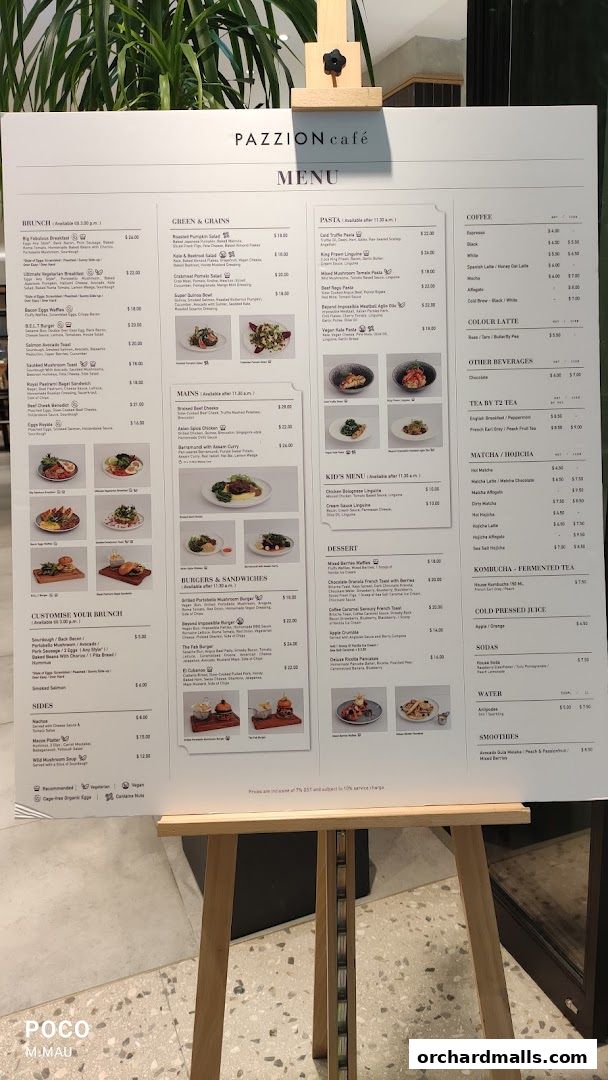 A menu board for Pazzion Cafe, displaying brunch, mains, pasta, burgers, and desserts.