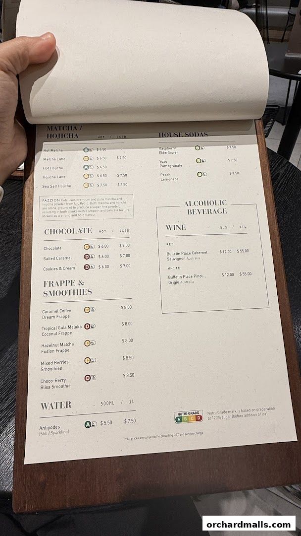 A menu from Pazzion Cafe featuring matcha, chocolate, frappes, smoothies, house sodas, wine, and water.
