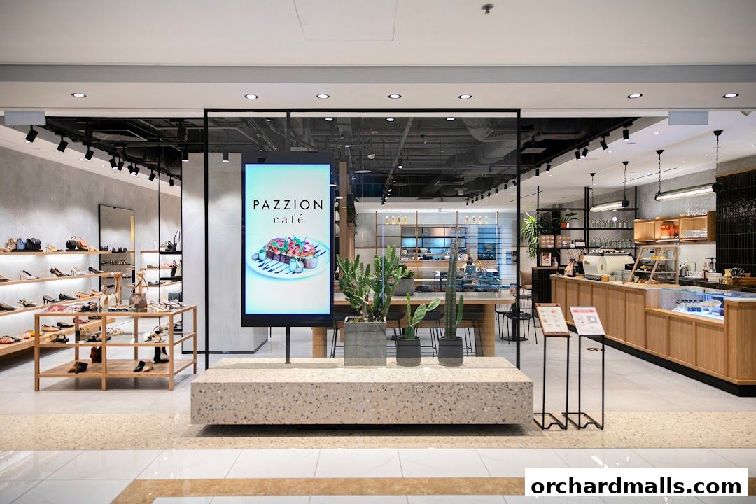 Pazzion Cafe storefront with shoes displayed and a digital menu board.