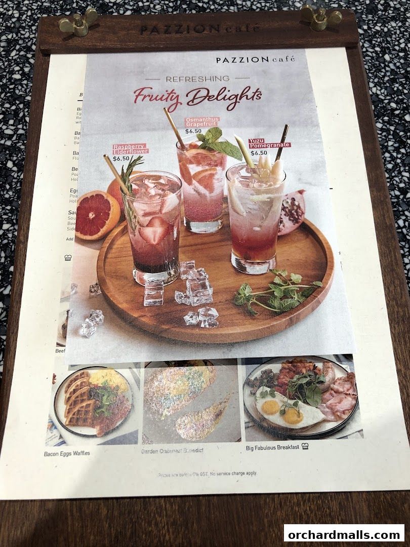 A menu from Pazzion Cafe showcasing refreshing fruity drinks and breakfast items.