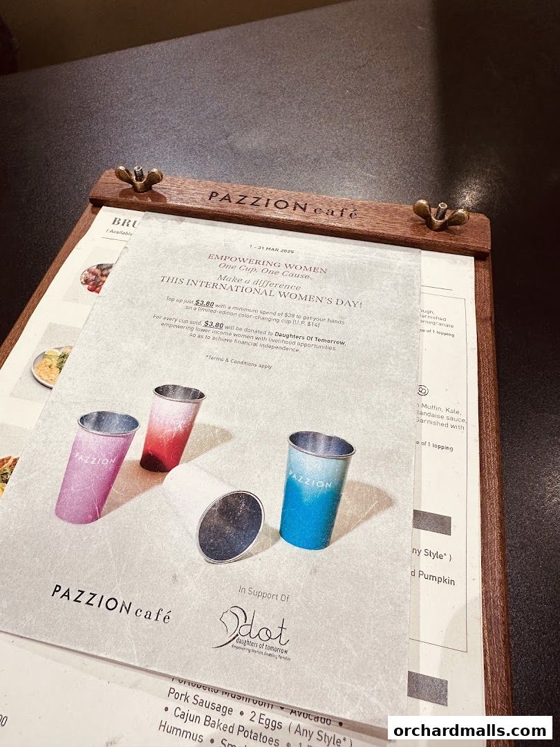 A menu from Pazzion Cafe featuring a special promotion for International Women's Day.