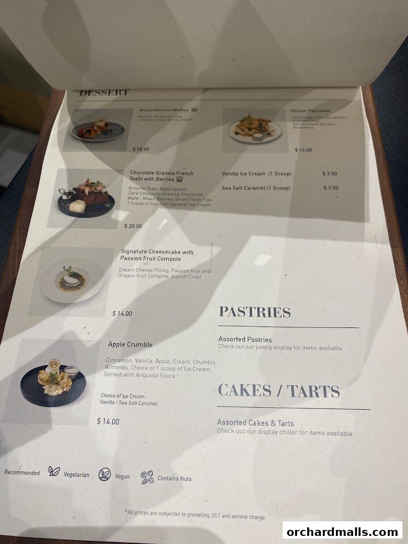 A menu page from Pazzion Cafe featuring desserts, pastries, and cakes with prices.